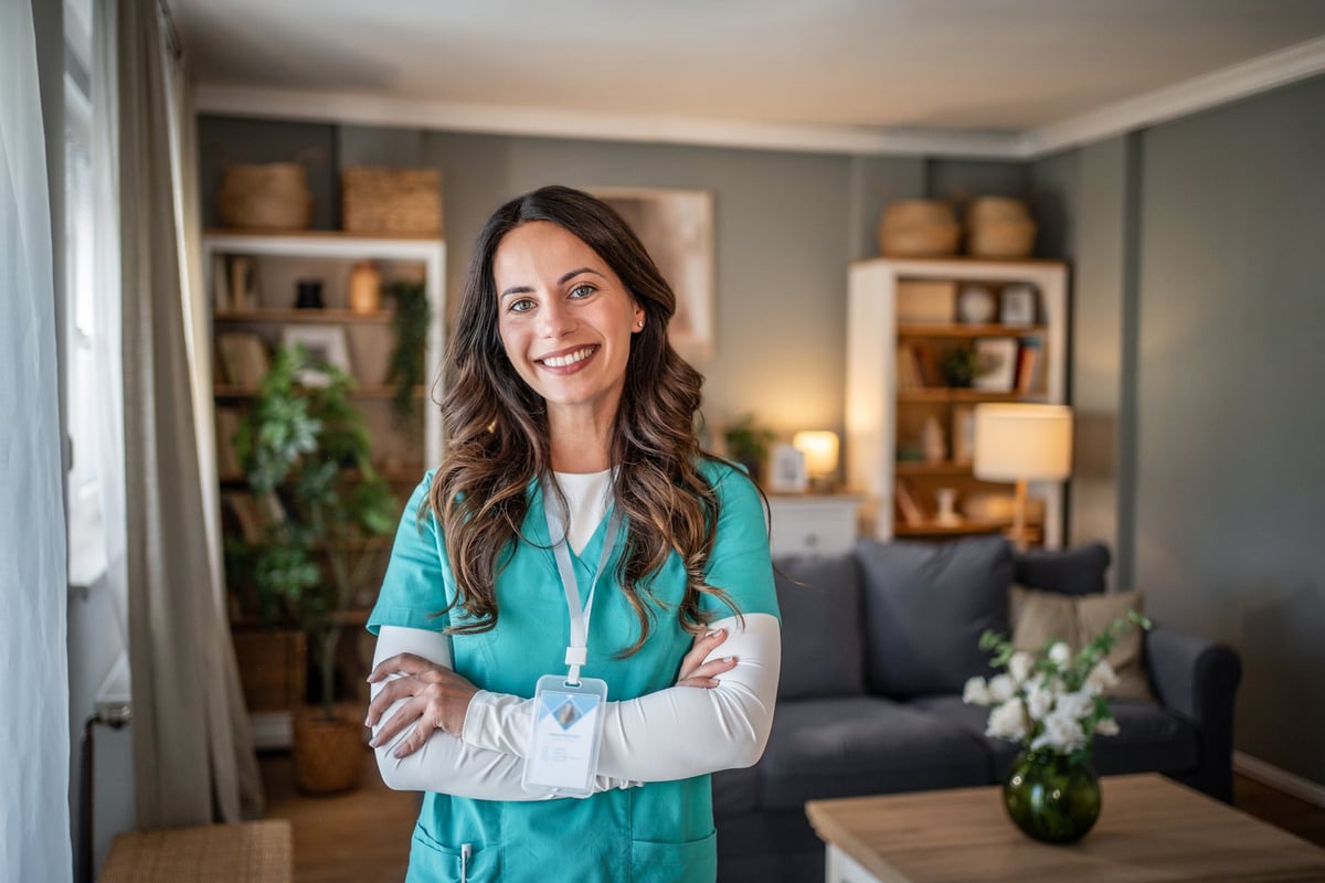 A compassionate in-home caregiver offering support and rest to a Veteran's family